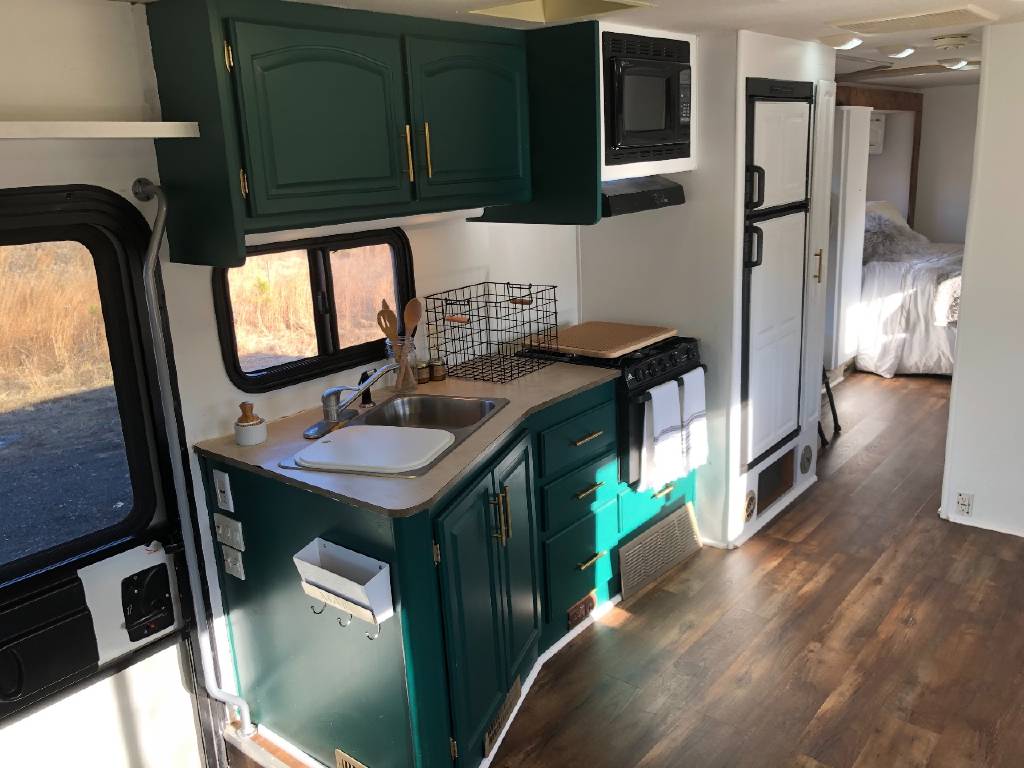 RV kitchen cabinets painted teal