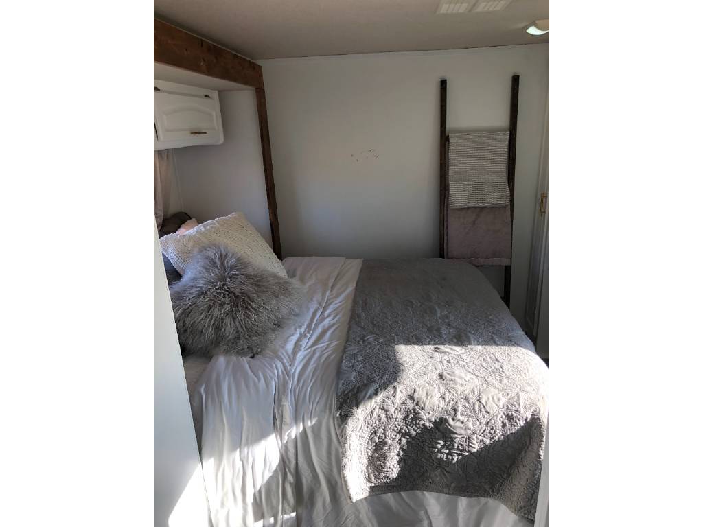 Bedroom in renovated camper motorhome