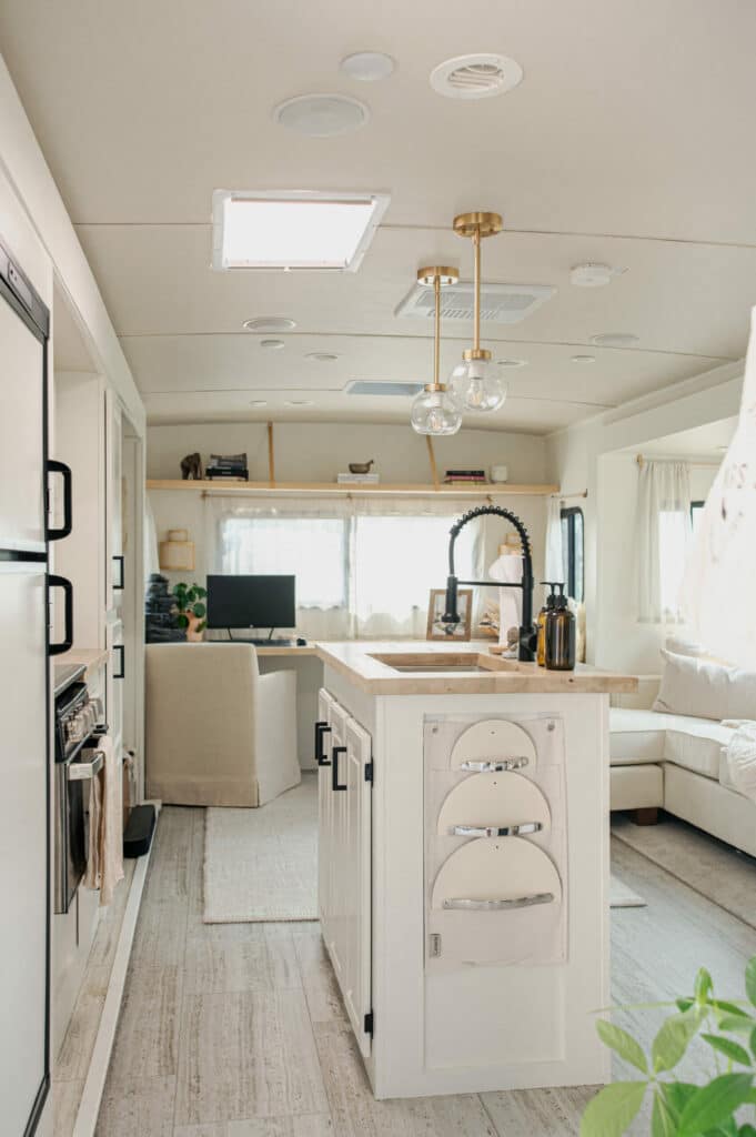 19. DIY PVC Towel Bar Beneath the Sink (Fresh Idea)[Photo placeholder – Alt text: small RV kitchen ideas DIY towel rack with PVC]A bit of PVC piping and some brackets can create a simple, durable towel bar. Place it on the inside of the cabinet door for easy access.