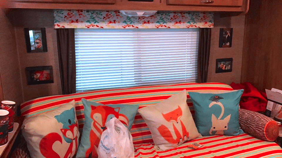 New fabric pinned over RV window valance