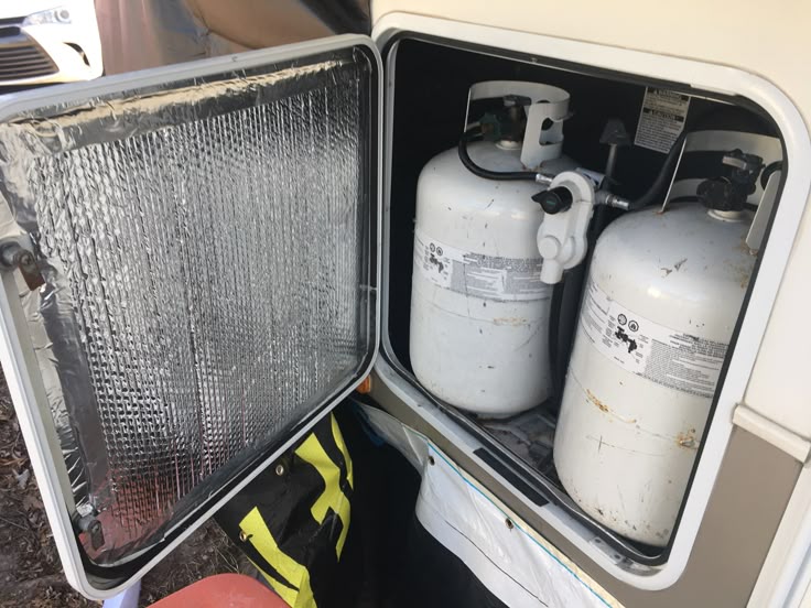 Heating an RV propane tank storage area
